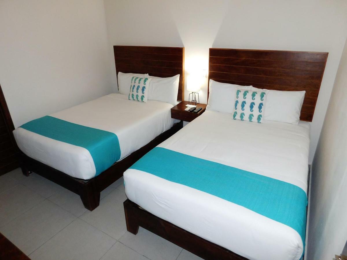 Aquastar Hotel & Apartments Mahahual Esterno foto